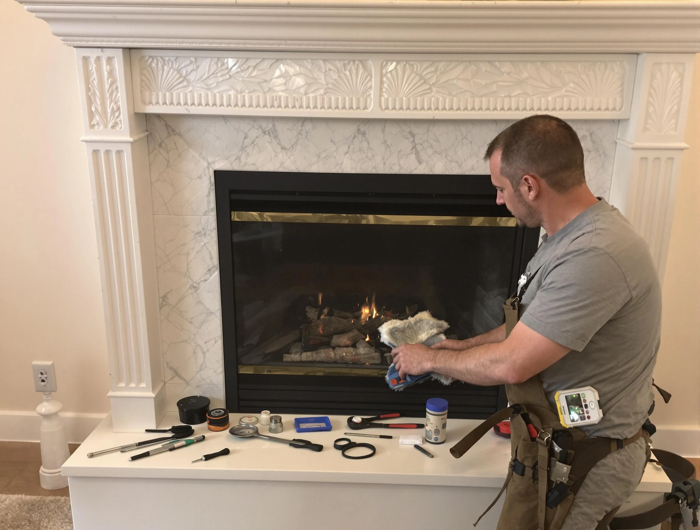 Suwanee Chimney Sweep performing fireplace maintenance in Suwanee, GA